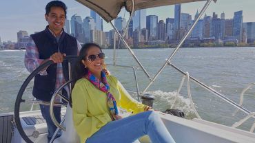 Romantic couple sailing with Manhattan skyline